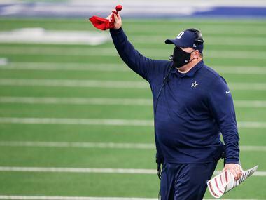 Dallas Cowboys head coach Mike McCarthy challenges the spot of the ball on a run play in a game against the Atlanta Falcons in the second half of play at AT&T Stadium in Arlington, Texas on Sunday, September 20, 2020. Dallas Cowboys defeated the Atlanta Falcons 40-39.