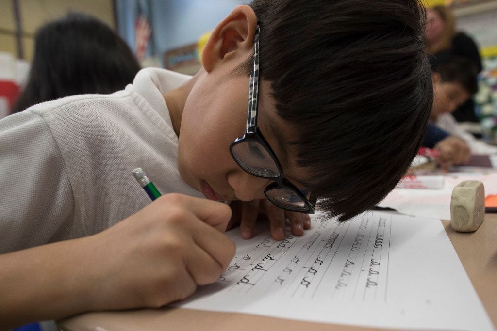 With a characteristic flourish, cursive writing is looping back into style in schools across...