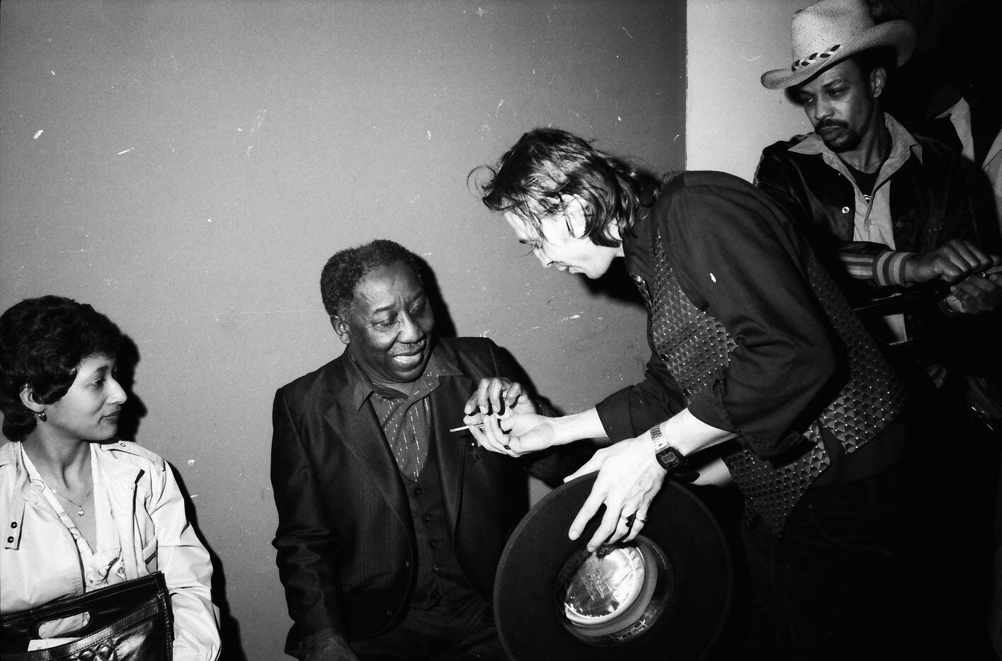 Muddy Waters and Stevie Ray Vaughan backstage at Nick's Uptown in 1981 (Photos by Kirby...