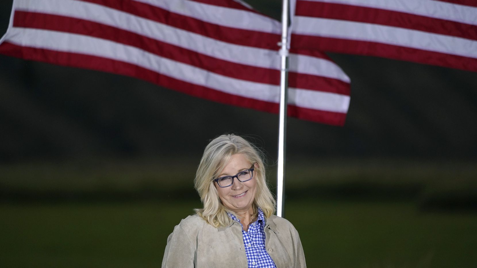 Rep. Liz Cheney, R-Wyo., waits to speak, Tuesday, Aug. 16, 2022, at a primary Election Day...