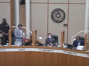 Dallas County Commissioner J.J. Koch was removed by a bailiff from the commissioners court meeting Aug. 3, 2021 for refusing to wear a mask.