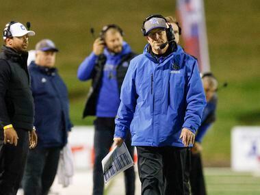 Dallas Christian head coach Mike Wheeler walks the sideline during a timeout during the...
