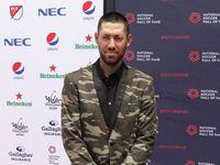 Clint Dempsey poses for a photograph during the National Soccer Hall of Fame ceremony at...