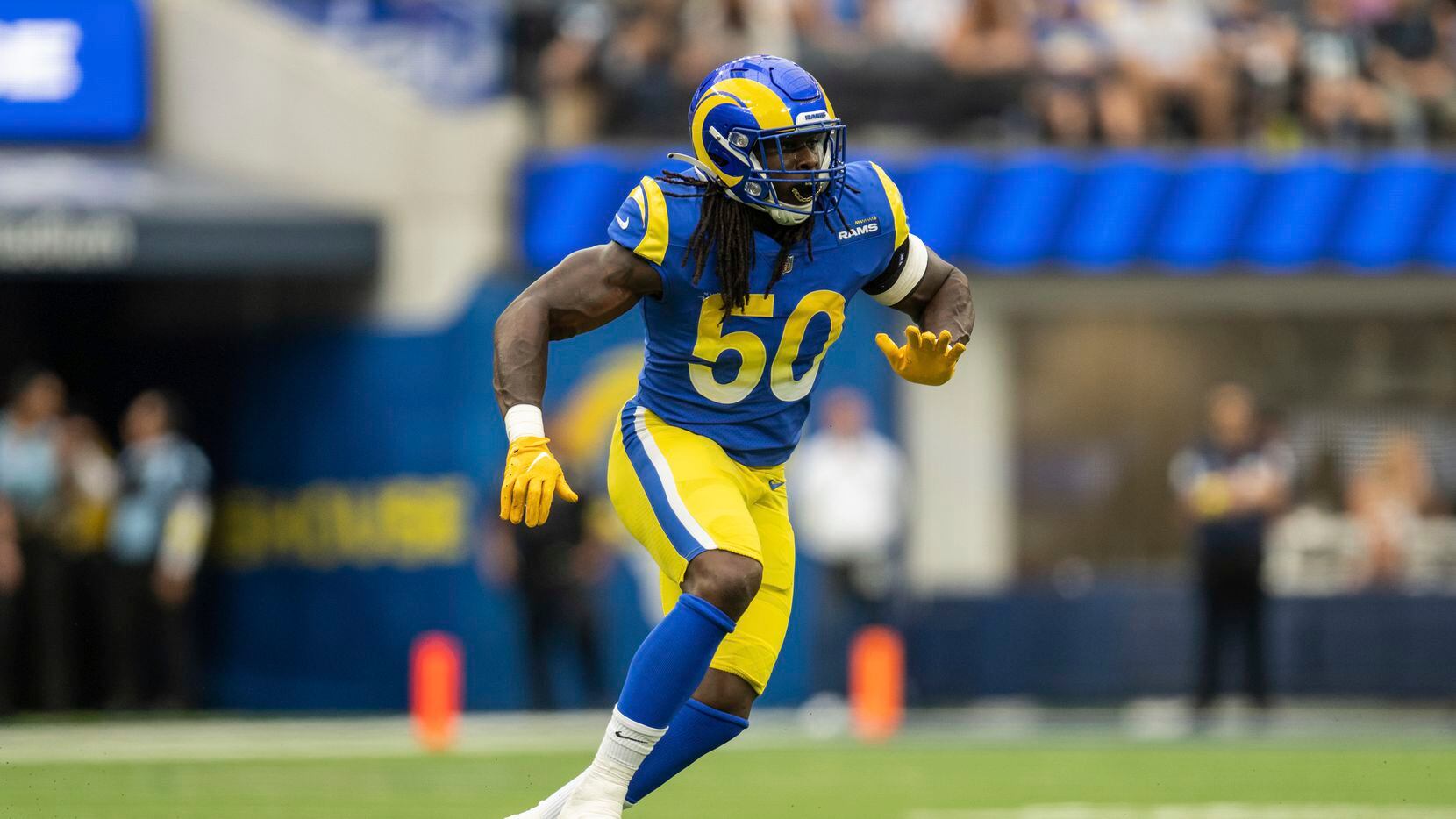 Los Angeles Rams defensive end Takkarist McKinley (50) runs during an NFL football game...