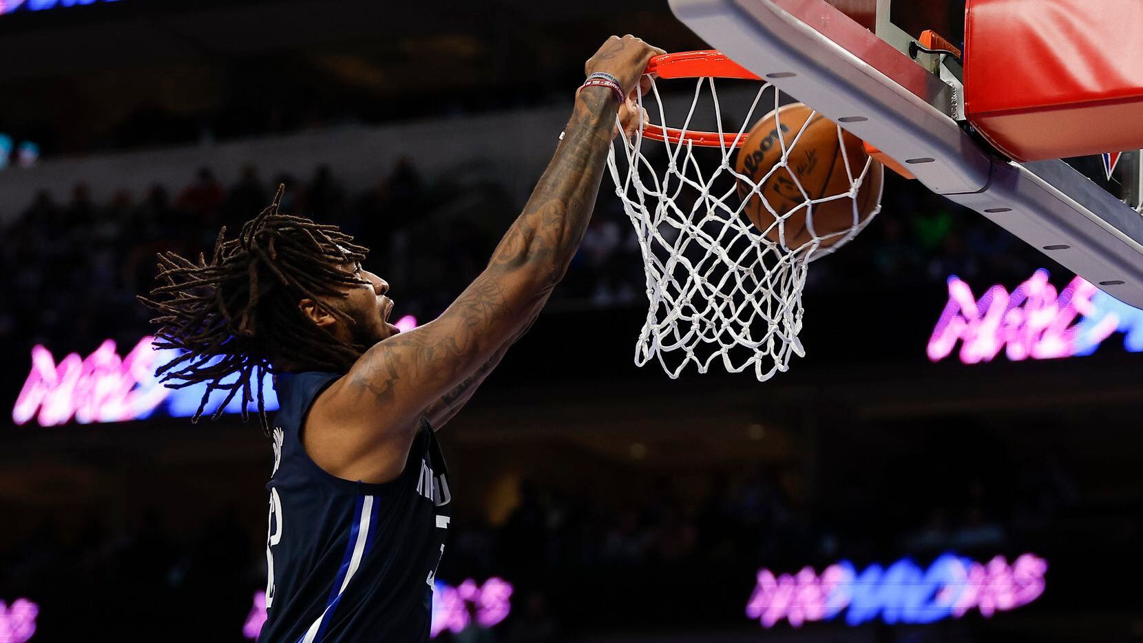Dallas Mavericks forward Marquese Chriss dunks during the second half of an NBA basketball game against the Minnesota Timberwolves in Dallas, Tuesday, December 21, 2021.