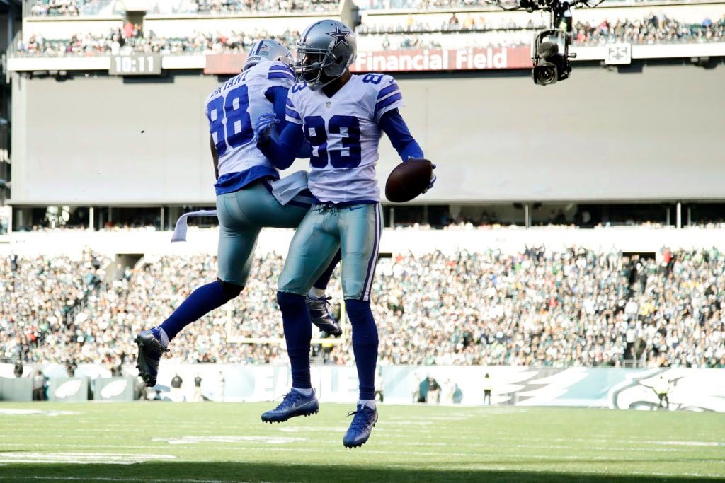 Dallas Cowboys' Terrance Williams (83) and Dez Bryant (88) celebrate after a touchdown by Williams during the first half of an NFL football game against the Philadelphia Eagles, Sunday, Jan. 1, 2017, in Philadelphia. (AP Photo/Matt Rourke)