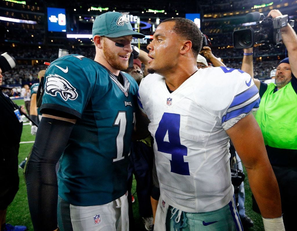 Philadelphia Eagles quarterback Carson Wentz (11) congratulates Dallas Cowboys quarterback...