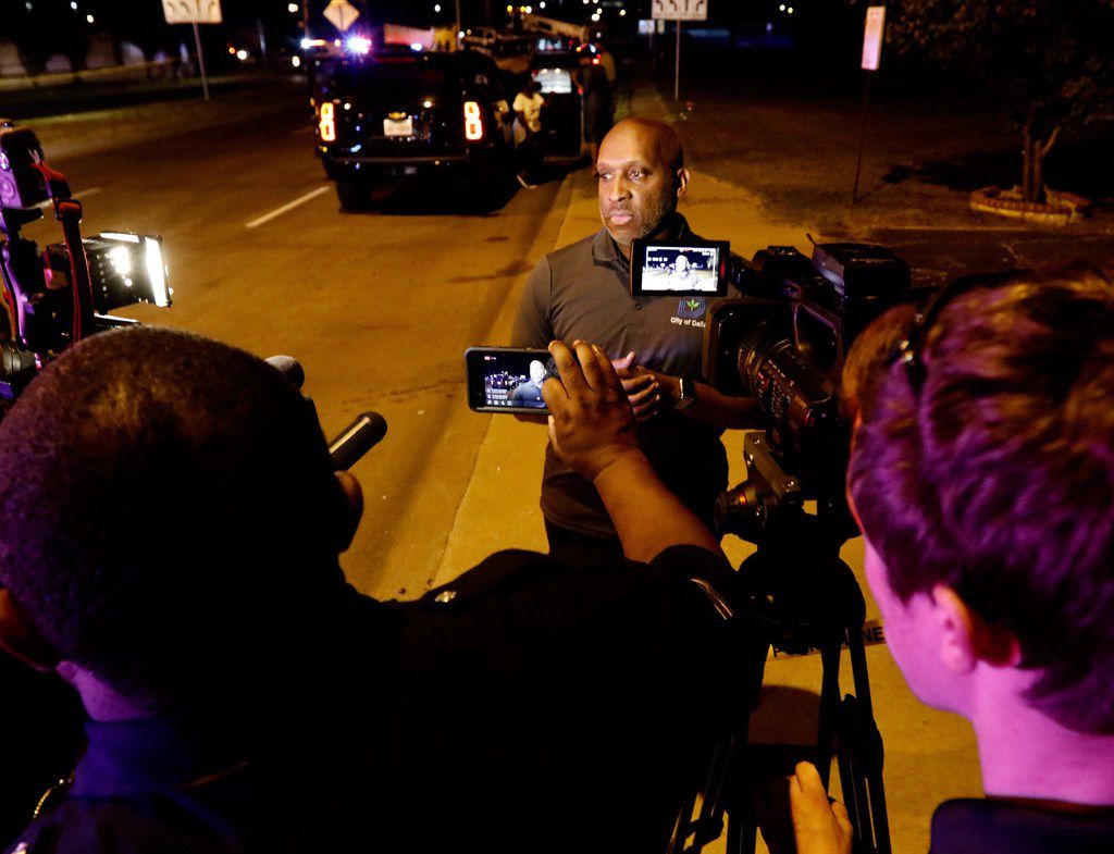 Dallas City Manager T. C. Broadnax, addresses the media at the accident site. A crane en...