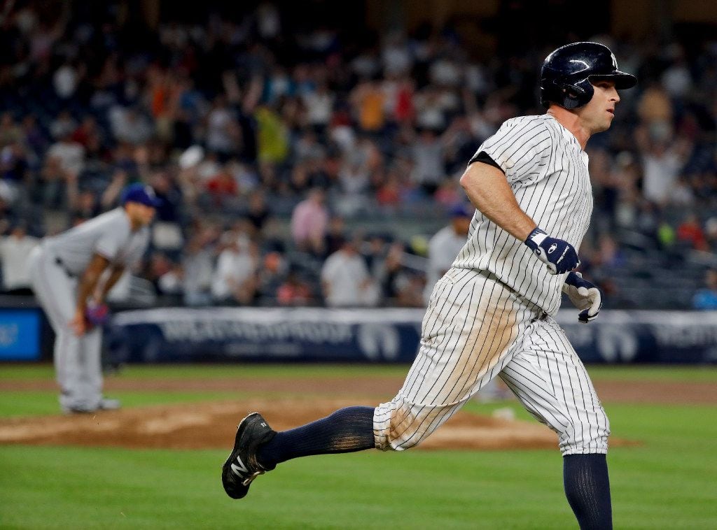 New York Yankees' Brett Gardner rounds first base after hitting a solo home run to tie the score against the Texas Rangers during the ninth inning of a baseball game, Friday, June 23, 2017, in New York. The Yankees won 2-1 in 10 innings. (AP Photo/Julie Jacobson)