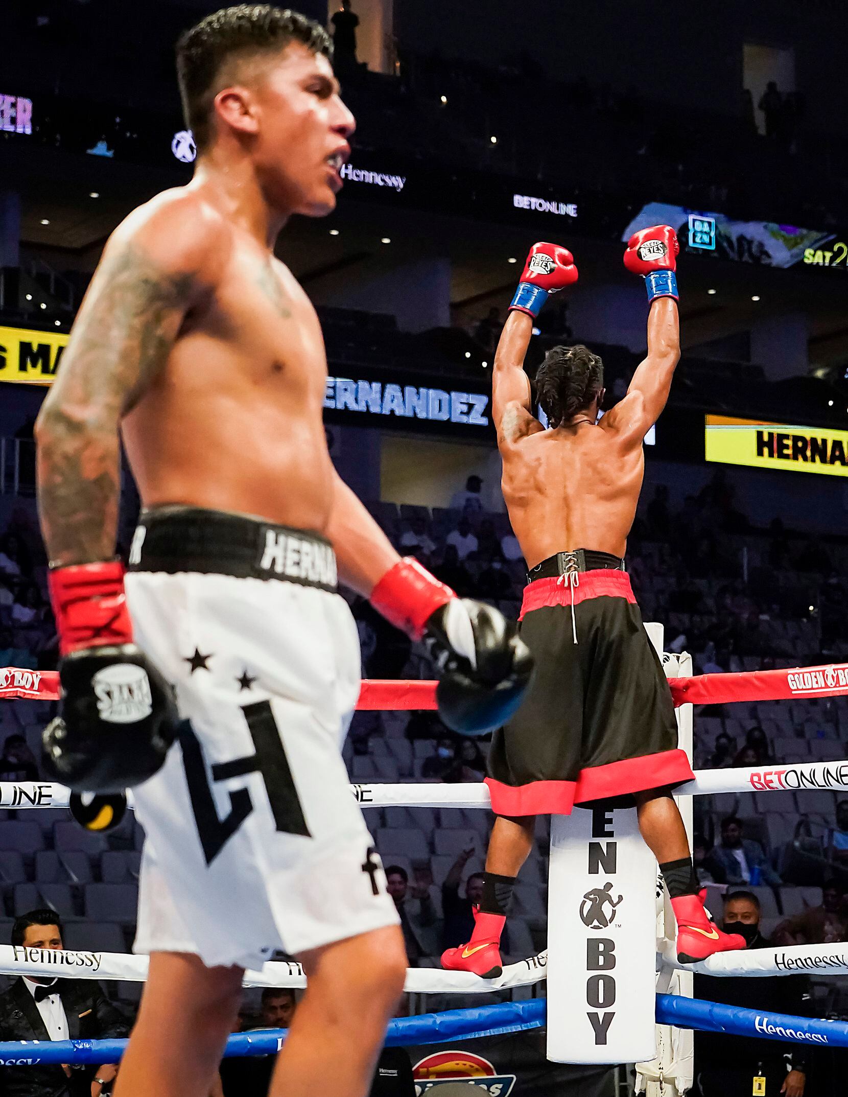 Alex Martin celebrates after defeating Luis Hernandez in a super lightweight bout at Dickies Arena on Saturday, March 20, 2021, in Fort Worth.