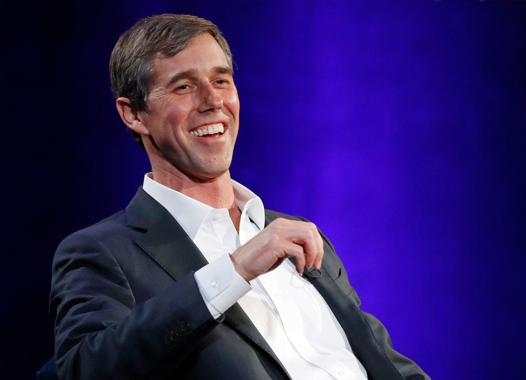 Former Texas Democratic congressman Beto O'Rourke laughs during a live interview with Oprah...