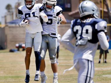 Dallas Cowboys wide receiver Simi Fehoko (81) is congratulated on his touchdown pass by...
