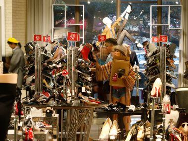 Teecy Mai shops for shoes at Neiman Marcus in NorthPark Center in Dallas.