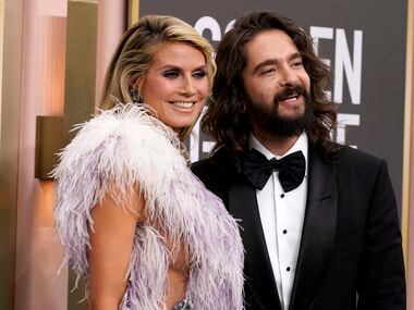 Heidi Klum, left, and Tom Kaulitz arrive at the 80th annual Golden Globe Awards at the...