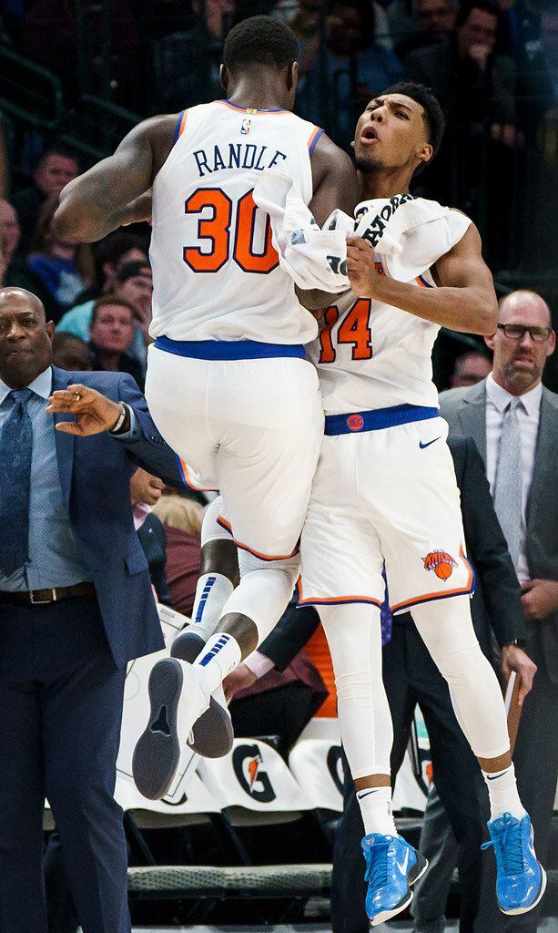 New York Knicks guard Allonzo Trier (14) celebrates after a basket made by forward Kevin Knox II (20) during the second half of an NBA basketball game at American Airlines Center on Friday, Nov. 8, 2019, in Dallas. (Smiley N. Pool/The Dallas Morning News)