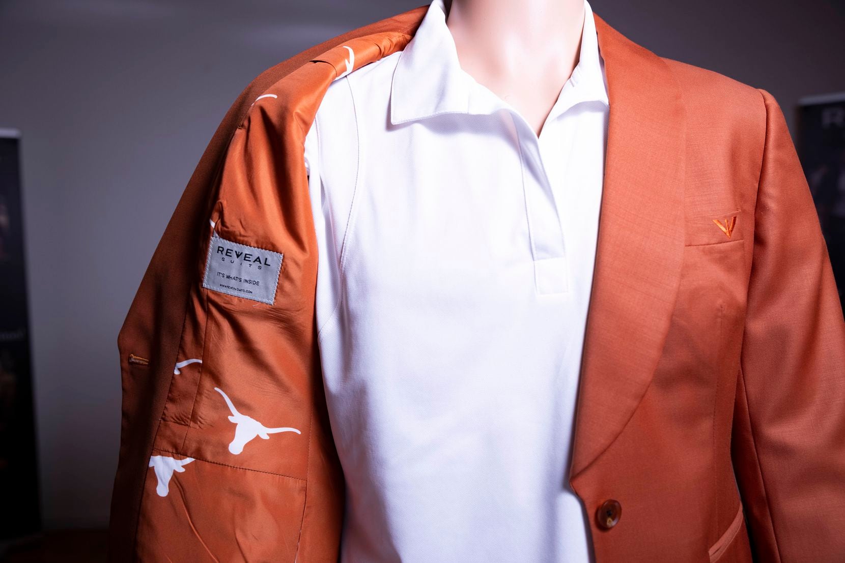 Burnt orange suit with a University of Texas lining by Reveal Suits. 