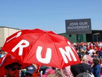 A crowd gathers to enter former President Donald Trump's first 2024 campaign rally on...