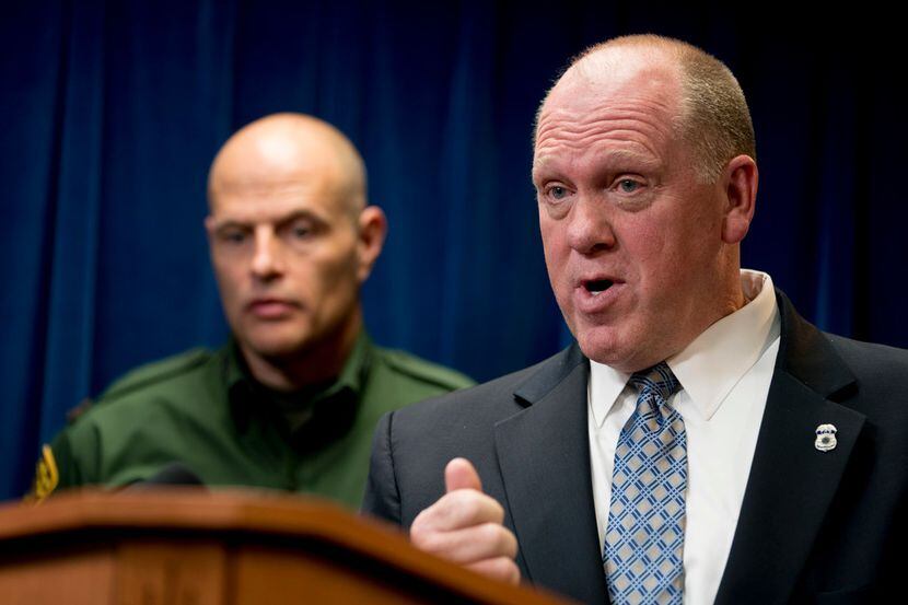 Acting Director for U.S. Immigration and Customs Enforcement Thomas Homan (right),...