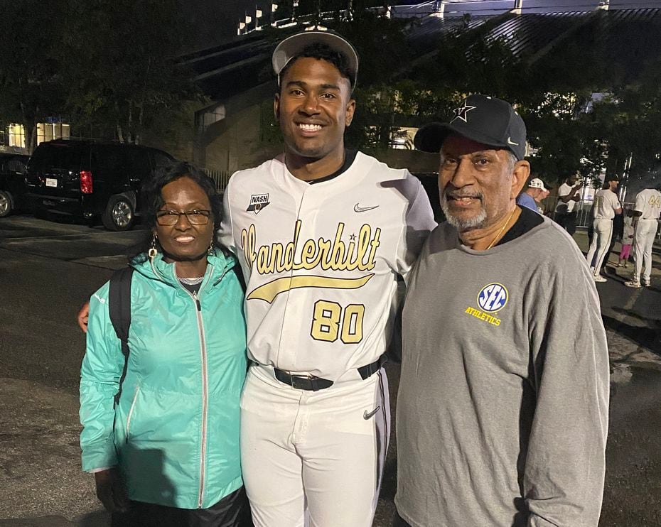 Texas Rangers pitcher Kumar Rocker is pictured with grandparents Evelyn and George Samuel.