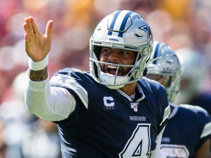 Dallas Cowboys quarterback Dak Prescott (4) signals a first down during the second quarter of an NFL game between the Dallas Cowboys and the Washington Redskins on Sunday, September 15, 2019 at FedExField in Landover, Maryland. (Ashley Landis/The Dallas Morning News)