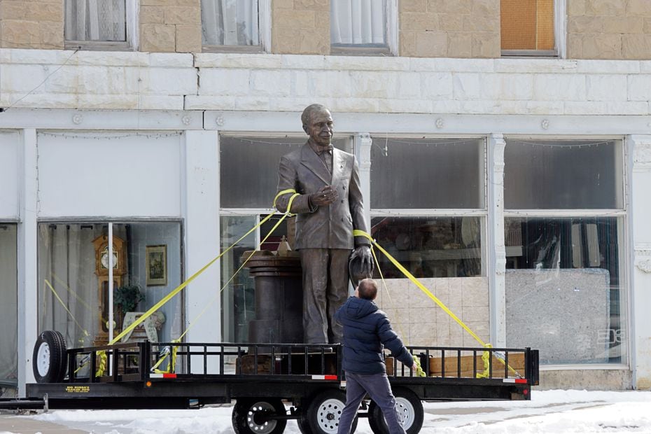 James Cash Penney statue in front of the Golden Rule store in Kemmerer, Wyo., the first...