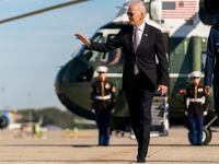 President Joe Biden boards Air Force One at Andrews Air Force Base, Md., Thursday, Oct. 6,...