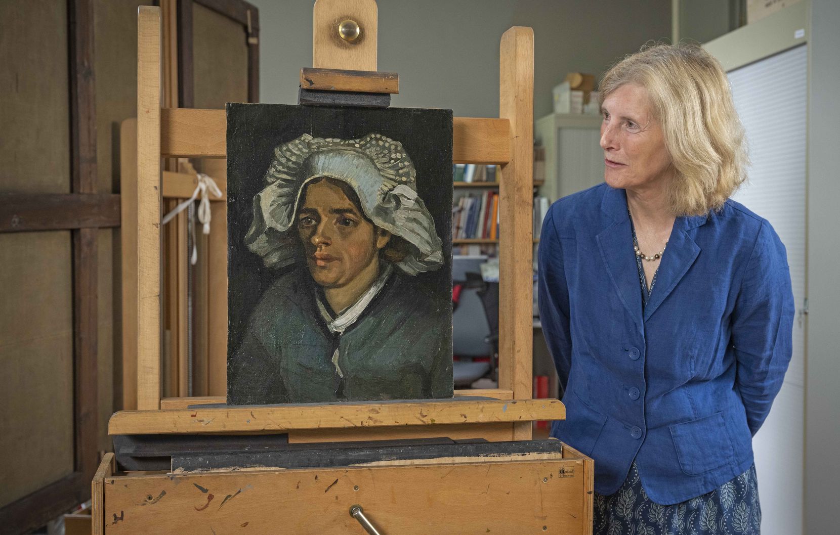 Senior Curator Frances Fowle viewed "Head of a Peasant Woman" by Vincent Van Gogh on June...