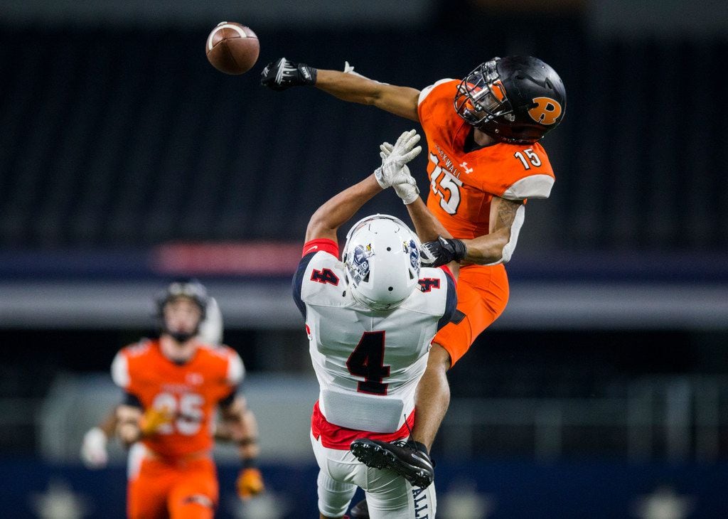 Rockwall defensive back PJ Barber (15) knocks away a pass intended for Allen wide receiver Darrion Sherfield (4) during the fourth quarter of a Class 6A Division I area-round high school football playoff game between Allen and Rockwall on Friday, November 22, 2019 at AT&T Stadium in Arlington. (Ashley Landis/The Dallas Morning News)