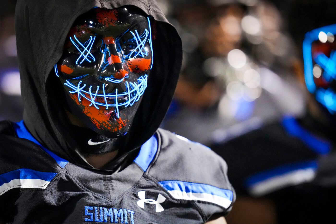 Mansfield Summit defensive back Tavare Smith Jr. (9) wears a face mask as he prepares to take the field for the first half of the Class 5A Division I Region I final against Colleyville Heritage on Friday, Dec. 3, 2021, in North Richland Hills, Texas. (Smiley N. Pool/The Dallas Morning News)