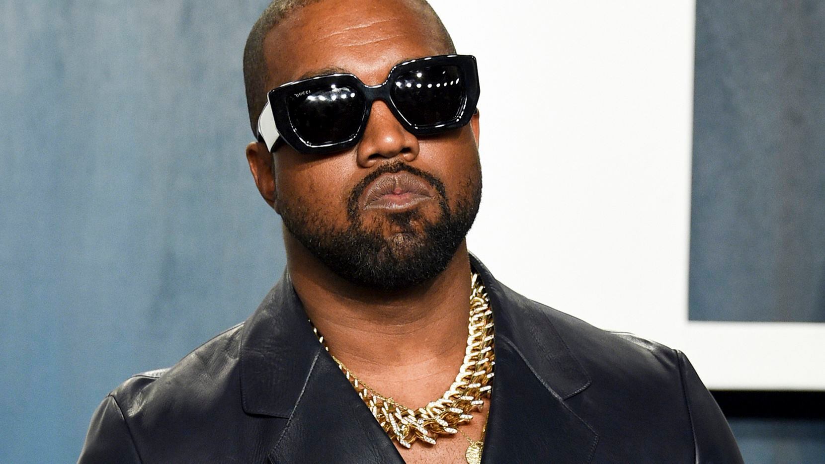 FILE - Kanye West arrives at the Vanity Fair Oscar Party on Feb. 9, 2020, in Beverly Hills,...