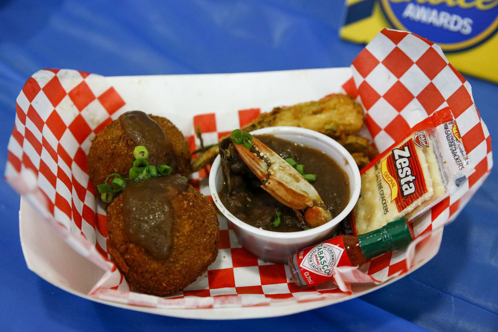 The fried gumbo balls will be sold in two locations at the fair: inside, at the Tower Building; and outside, across from the livestock birthing barn. The State Fair of Texas runs Sept. 24 through Oct. 17, 2021.