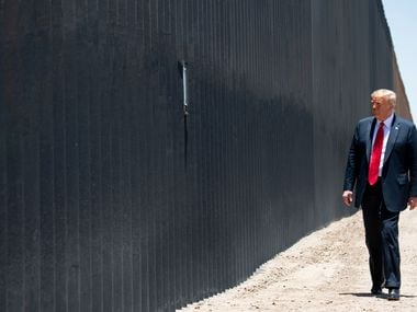 President Donald Trump marks the 200th mile border wall at the international border with Mexico in San Luis, Arizona, June 23, 2020.