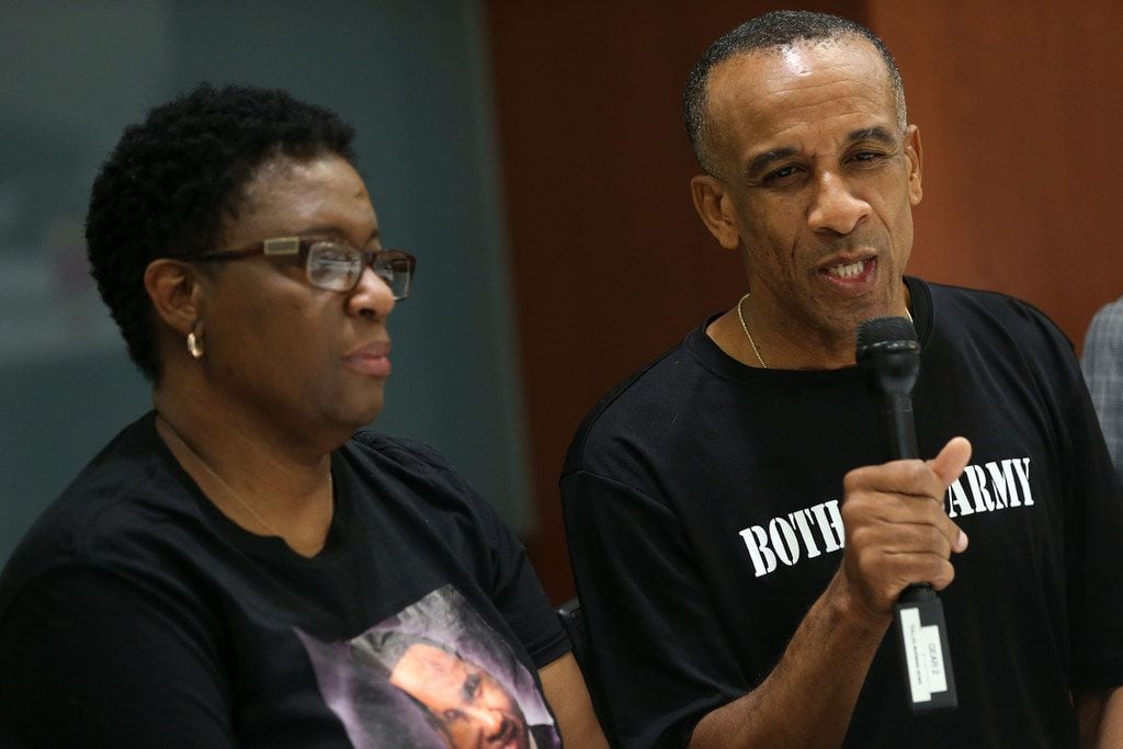 Bertrum Jean, the father of Botham Jean, speaks next to his wife Allison Jean during an...