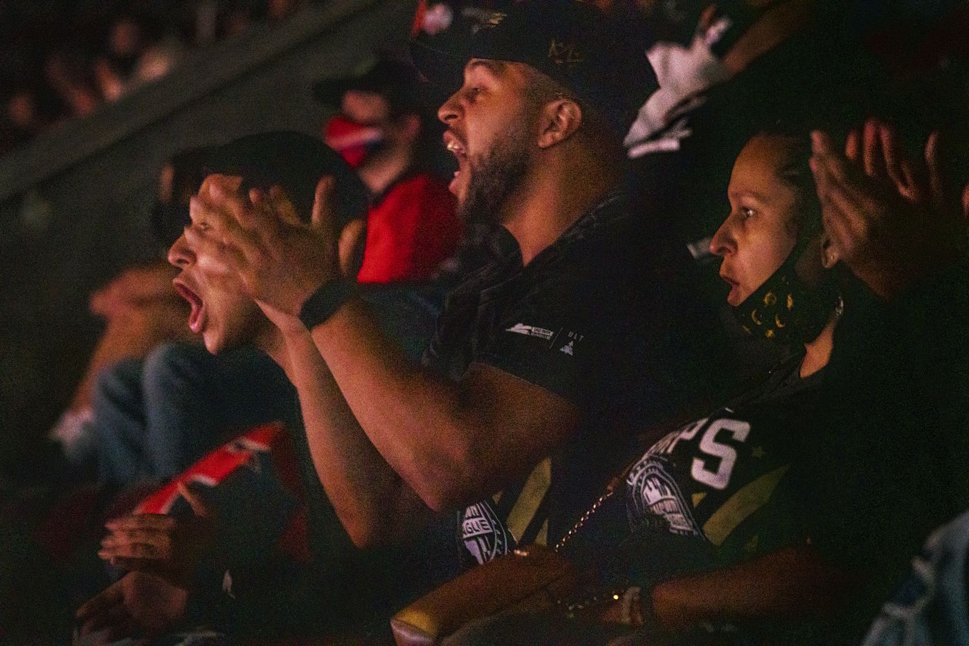 From left, Anthony “Shotzzy” Cuevas-Castro brothers Steven Quevedo, Gabriel Castro, and his mother Christina Hernandez cheer as they watch their Shotzzy compete during the winners final of the Call of Duty league playoffs at the Galen Center on Saturday, August 21, 2021 in Los Angeles, California. The Empire lost to FaZe 0 - 3 in their first match of the day but are still in contention to play in the finals through the elimination finals. (Justin L. Stewart/Special Contributor)