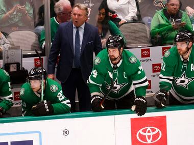Dallas Stars coach Rick Bowness watches his team play the Arizona Coyotes during the second...
