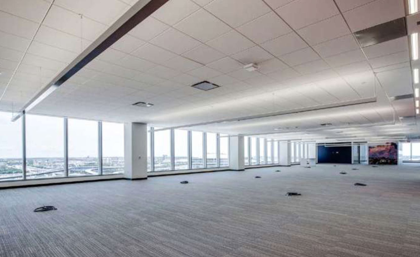 Liberty Mutual is seeking to rent out seven empty floors in one of the high-rises.