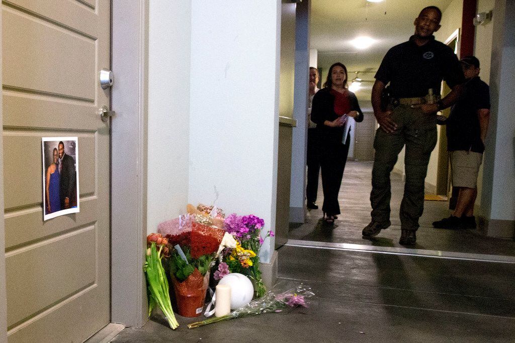 A memorial took shape at Botham Jean's front door at the South Side Flats, where off-duty...