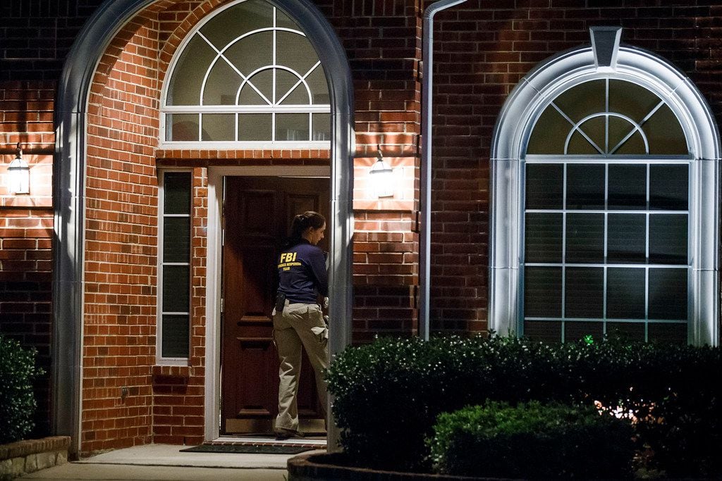 Members of an FBI evidence response team enter the family home of Sherin Mathews in the 900...