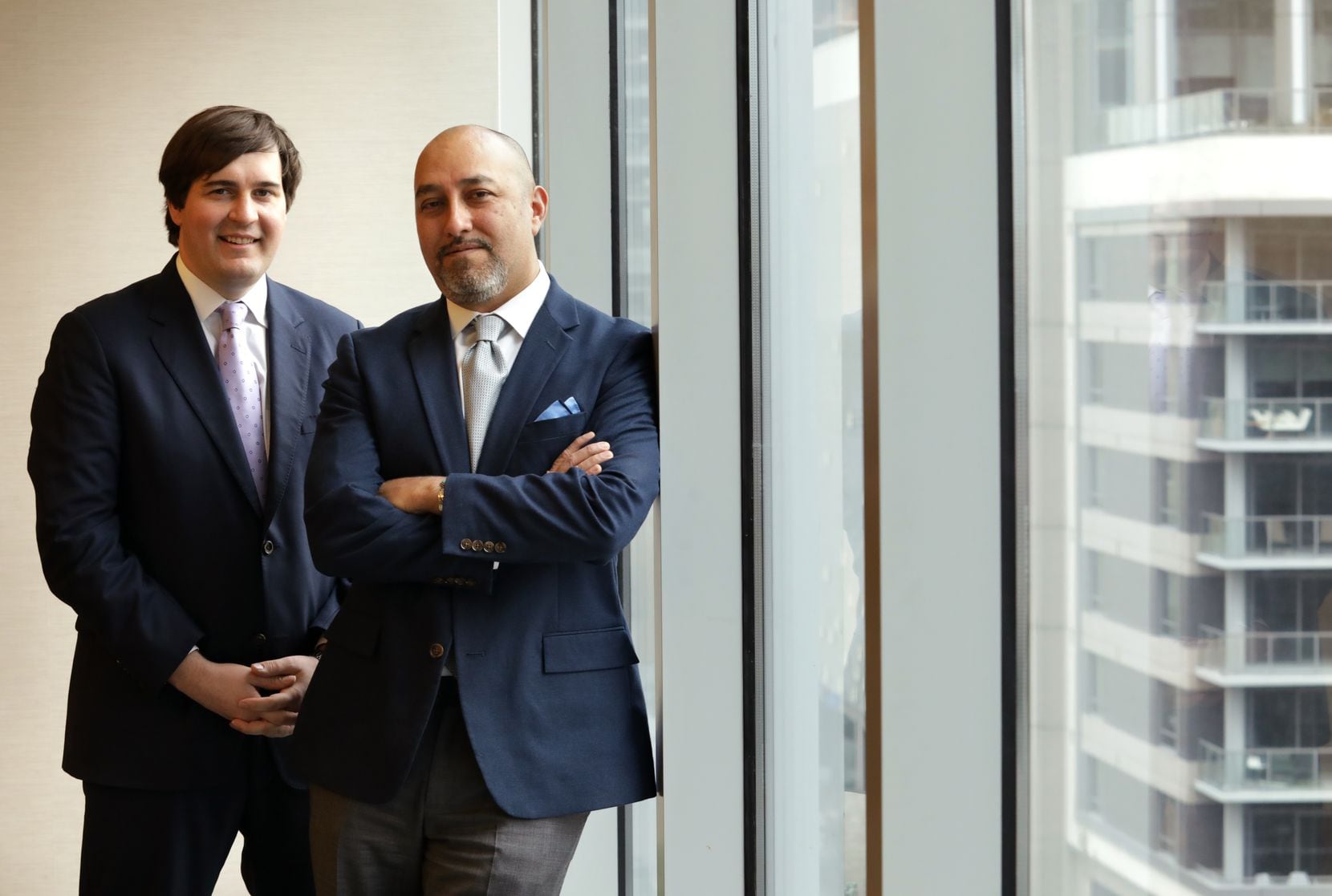 Luis Campos (right) and Brent Beckert are lawyers with Haynes and Boone in Dallas who...