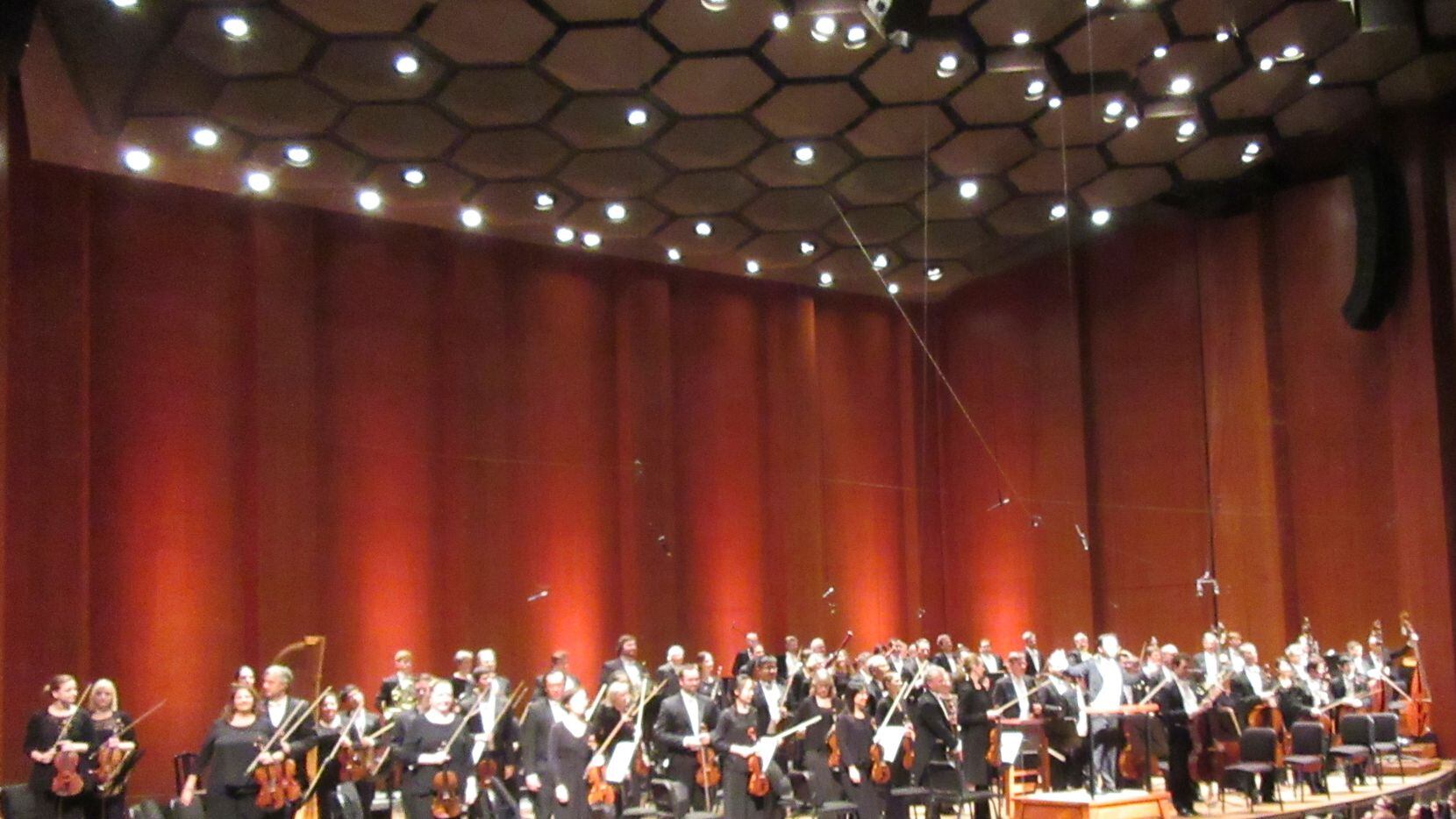 Guest conductor James Gaffigan acknowledges applause after leading the Houston Symphony in...