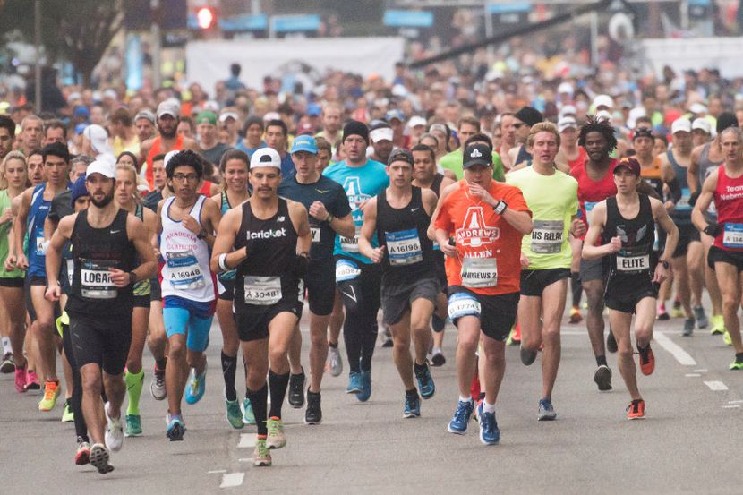Runners begin the BMW Dallas Marathon and half marathon.  