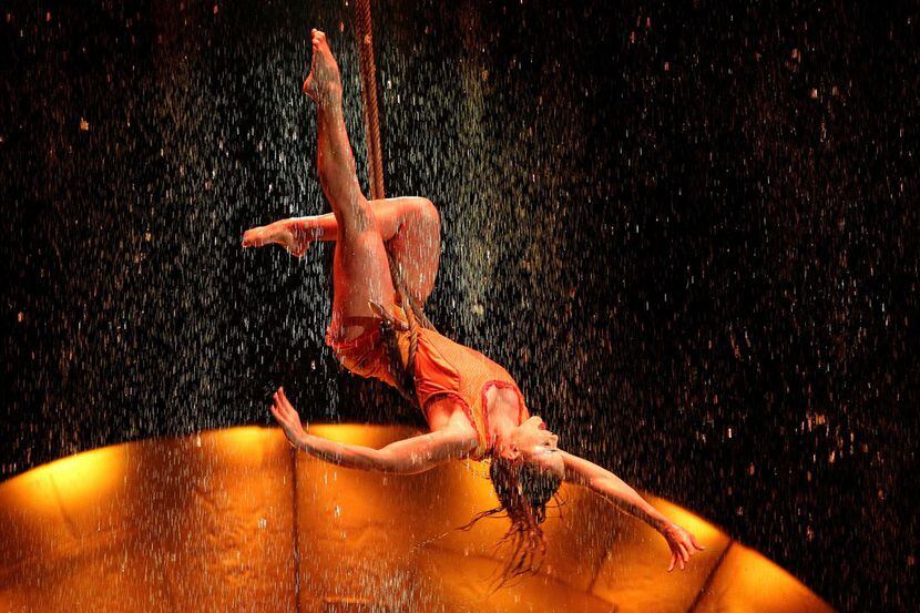 Artists of the Canadian entertainment company "Cirque du Soleil" perform as part of the...