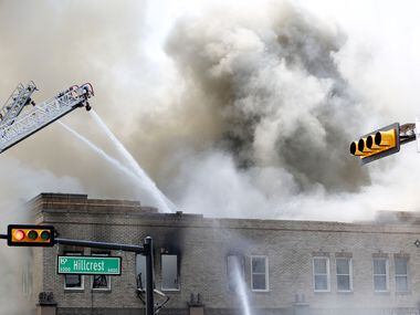 Firefighters respond to a fire at Goff's on Hillcrest Avenue in Dallas Friday August 12,...