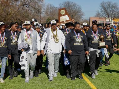 South Oak Cliff head coach Jason Todd leads the South Oak Cliff team to the stage before a...