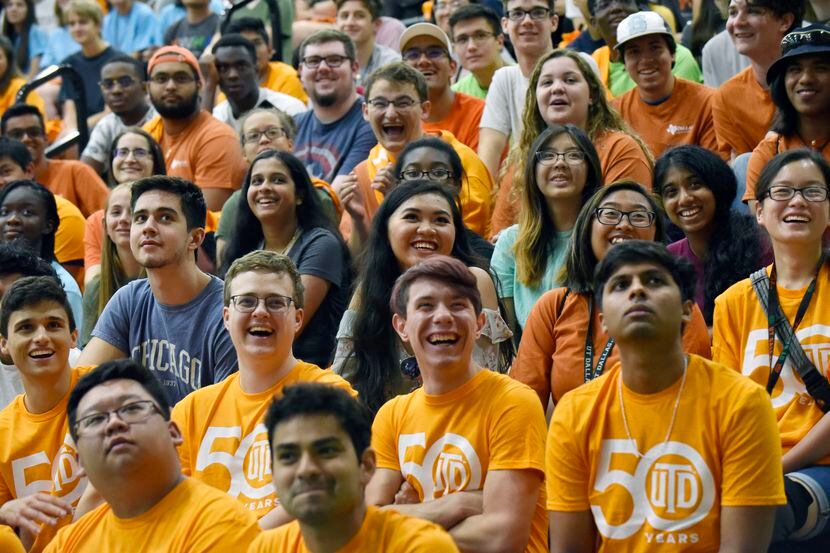 New students react with laughter as they watch a video promoting UTD during a new student...