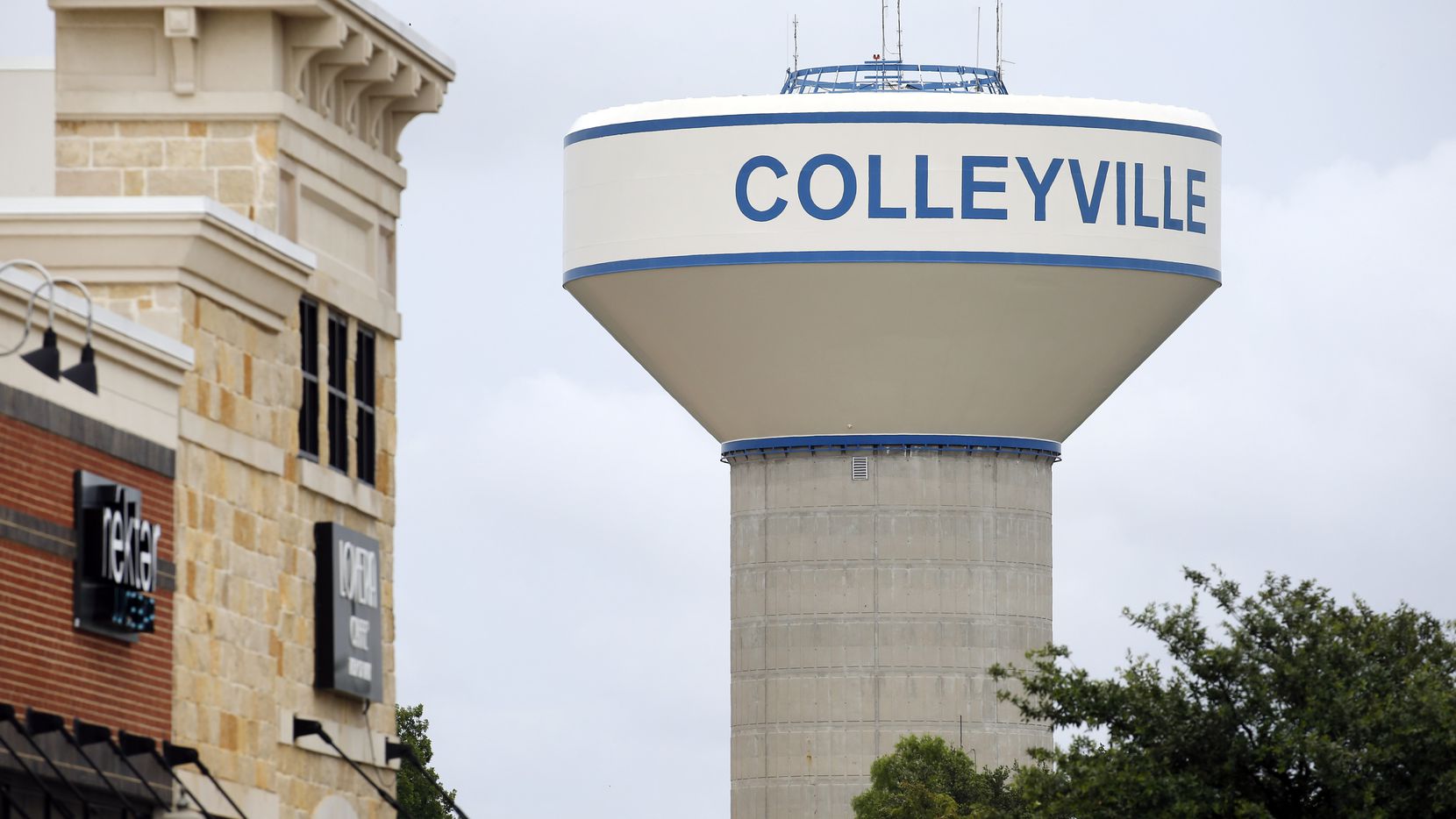 A Colleyville water tower is pictured near a shopping center in Colleyville, Texas, Tuesday, June 23, 2020. (Tom Fox/The Dallas Morning News)