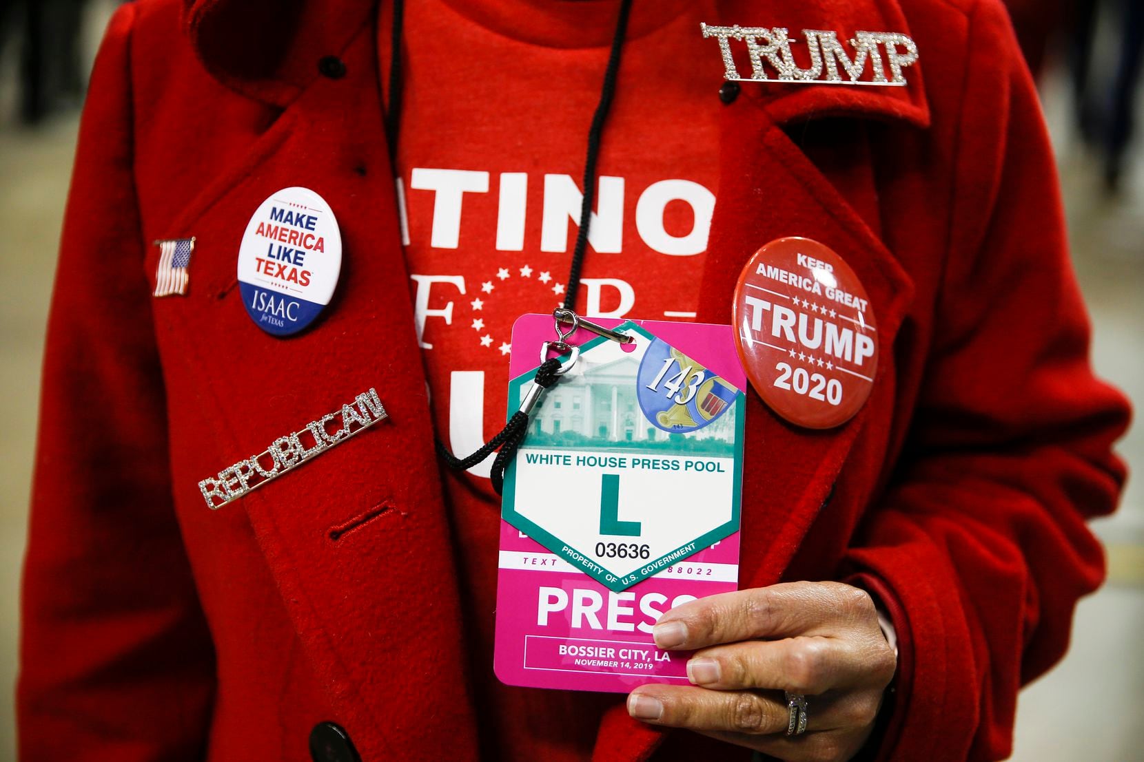 Martha Doss sported an official White House press credential at a rally to reelect President Donald Trump in Bossier City, La., on Nov. 14, 2019. Doss was sent by the National Republican Hispanic Assembly to create social media content.