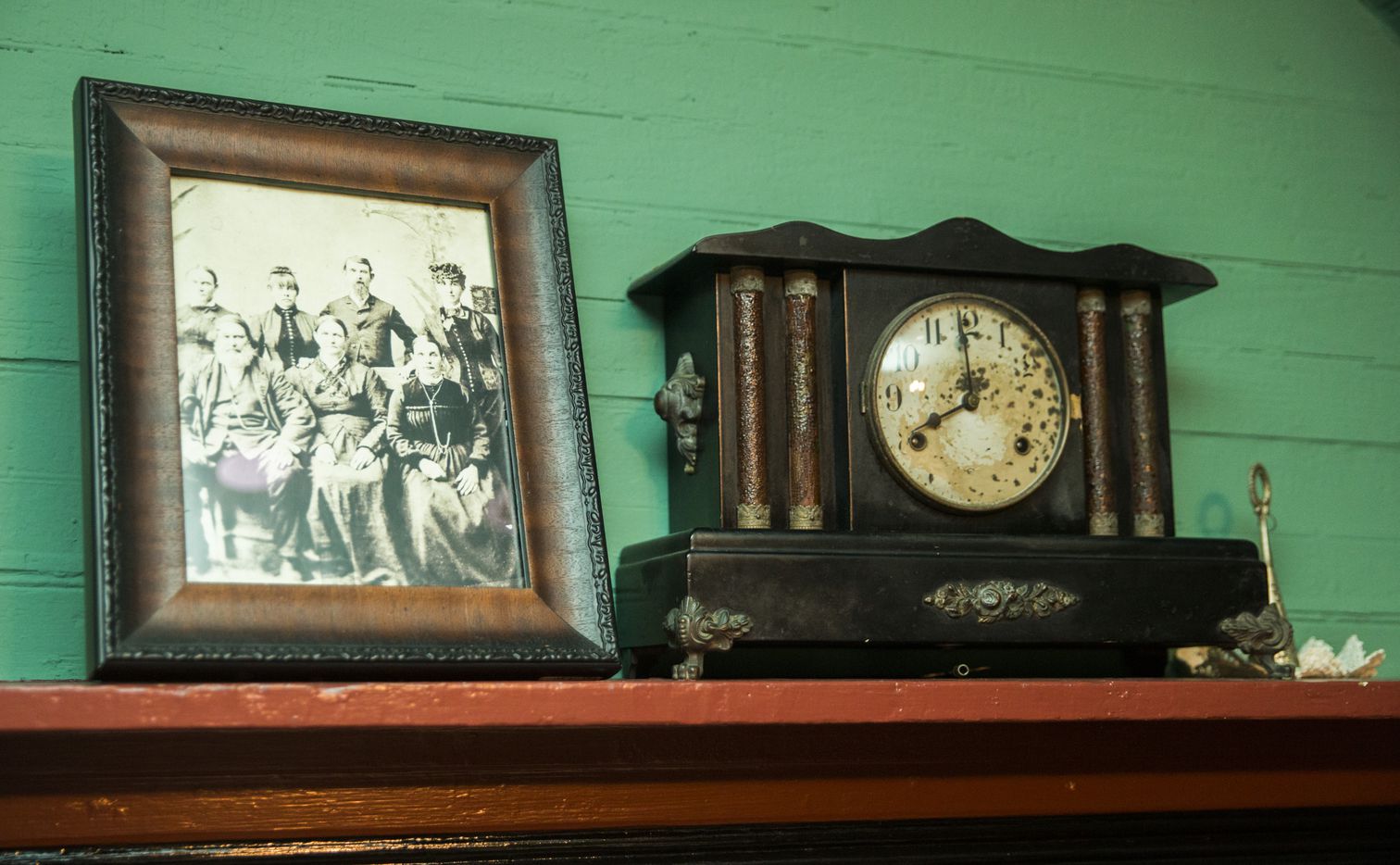 A portrait of the Lawrence family is displayed on the dining room mantle inside the oldest part of the home.