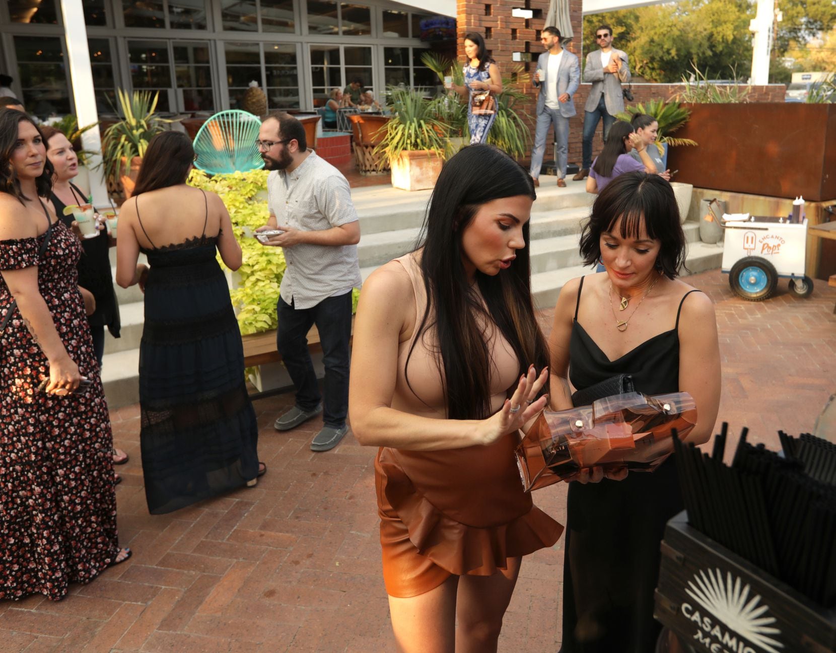 Jenna Owens, left, talks with Taylor Madison during a Fitish promotional event at Jose in Dallas, TX, on Oct. 3, 2019. (Jason Janik/Special Contributor)