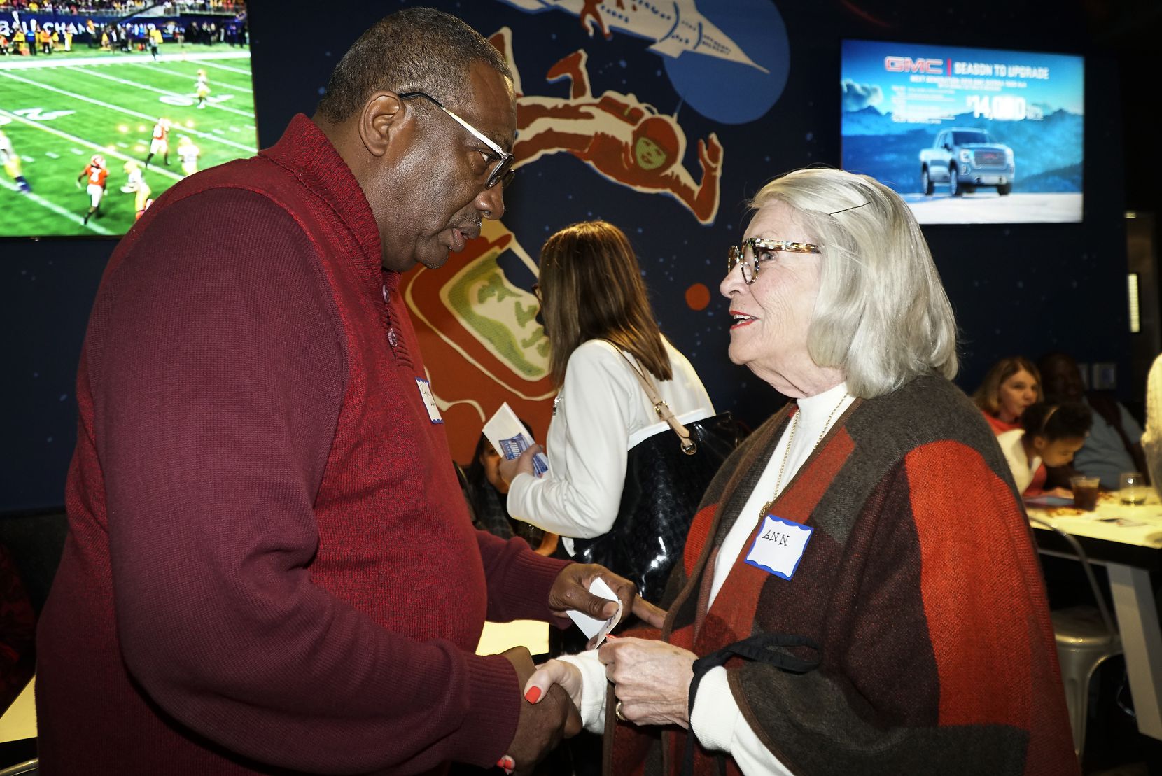 U.S. Senate hopeful Royce West, shown speaking with Ann Fichtenberg during the Texas Justice Tour at The Moon Bar in Fort Worth on Dec. 7, says a raft of Democratic candidates up and down statewide ballots will help defeat GOP incumbent John Cornyn.